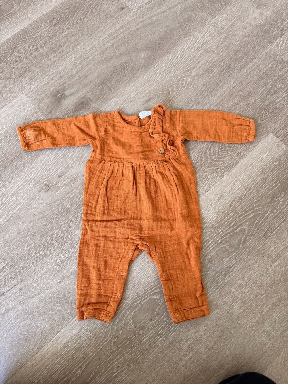 Long-Sleeve Orange Ruffled Baby Romper